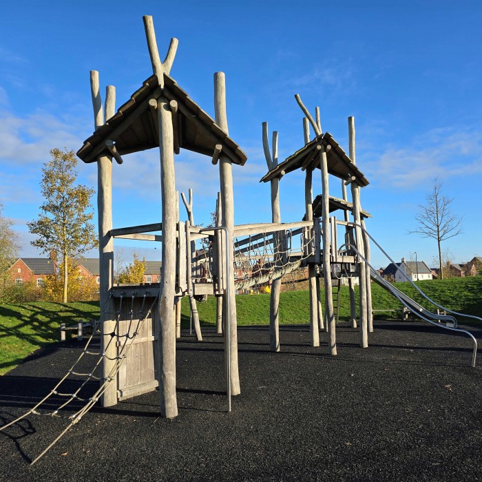 A childrens play structure on a sunny day in the UK