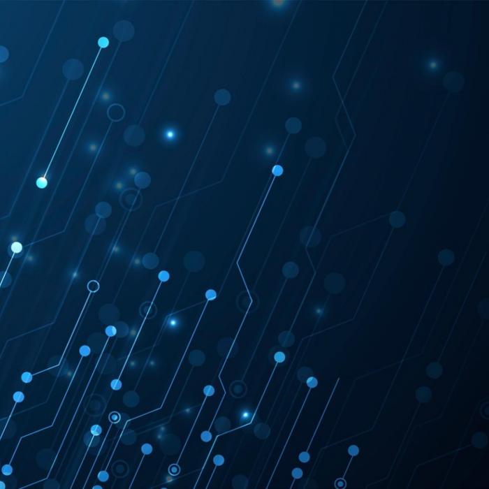 A background mage of dark blue with light blue glowing specks 